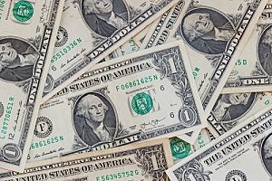 one dollar bills that were saved through a Fairfax, VA CDARS program