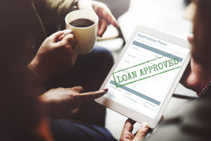 an online application for a business line of credit with an approval stamp on it