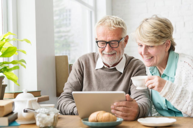 Couple reviewing individual retirement accounts