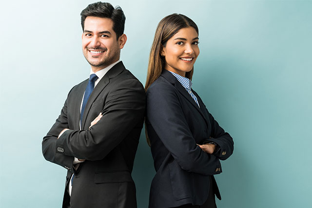 young man in women in business clothes smiling